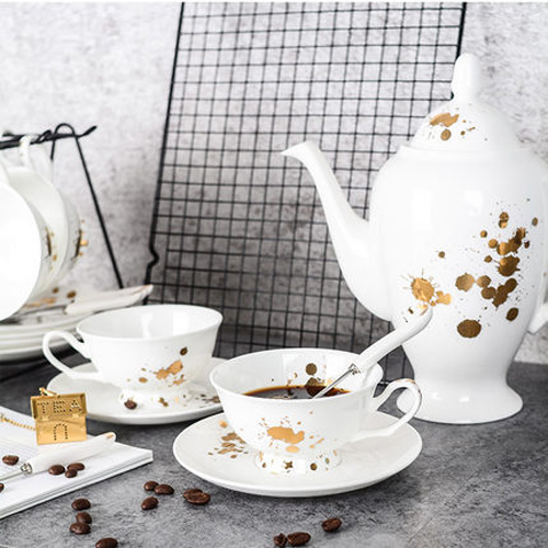 White bone china drinking set decoretive with gold pattern