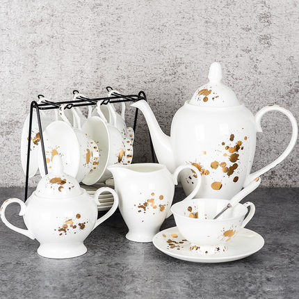 White bone china drinking set decoretive with gold pattern