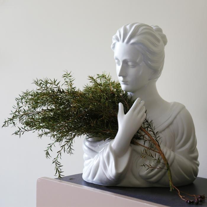 Resin Figurines of  Girl with Seabuckthorn in Her Arms