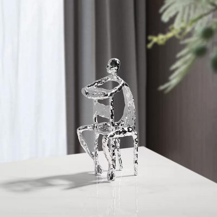 Metal  Decorations of Person Sitting in Chair