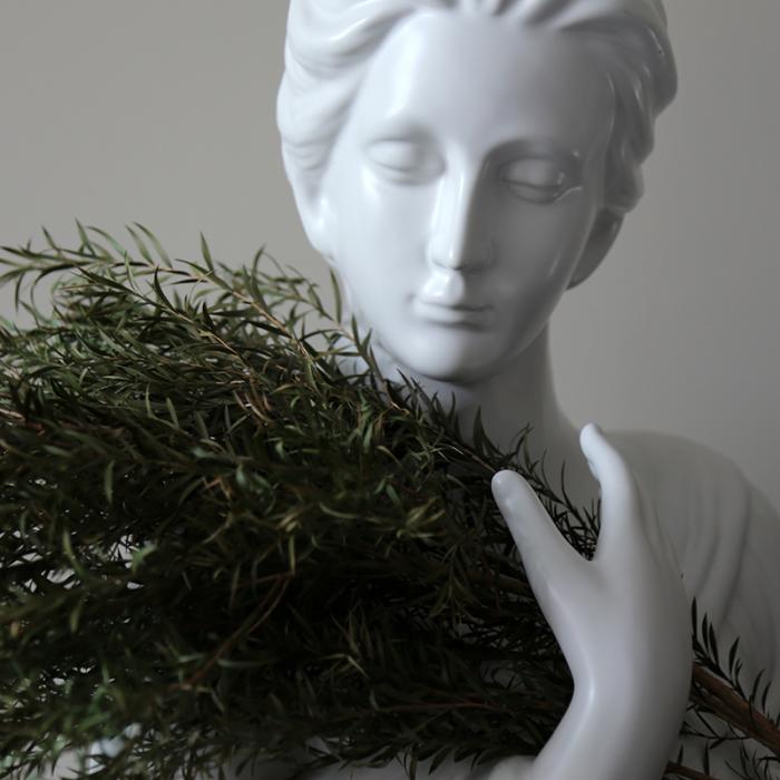 Resin Figurines of  Girl with Seabuckthorn in Her Arms