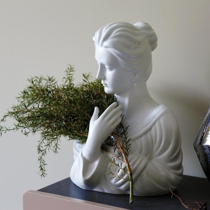 Resin Figurines of  Girl with Seabuckthorn in Her Arms